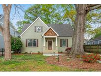 Charming home with a cozy porch and professionally landscaped front yard at 68 Spence Se Ave, Atlanta, GA 30317