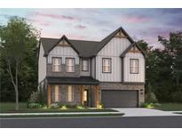 Charming two-story home featuring brick and siding, a covered porch, and an attached two-car garage at 3982 Adler Cir, Buford, GA 30519