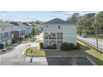 Charming two-story home with double balconies and a well-manicured front lawn at 725 Mcwilliams Se Rd, Atlanta, GA 30315