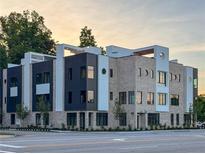 Modern building featuring a gray brick facade, dark metal accents, and contemporary architectural details at 3960 Clairmont Rd # 2, Chamblee, GA 30341