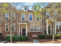 Charming townhouse with a well-manicured lawn and inviting entrance, perfect for comfortable living at 4899 Seldon Se Way, Smyrna, GA 30080