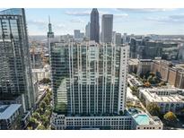 Modern high-rise building with a swimming pool and stunning city views at 860 Peachtree Ne St # 2118, Atlanta, GA 30308