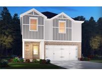 Charming two-story home with a brick facade and a two-car garage at 2762 Aralynn Way, College Park, GA 30337
