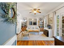 Inviting living room with hardwood floors, area rug, ceiling fan, and an abundance of natural light at 794 Frederica Ne St # 2, Atlanta, GA 30306