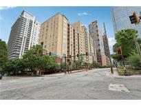 The exterior of this building is modern, with a clean and stylish design and lush landscaping around the perimeter at 1101 Juniper Ne St # 415, Atlanta, GA 30309