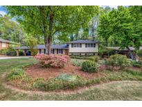 Charming home with well-maintained lawn and mature trees at 2921 Country Squire Ln, Decatur, GA 30033