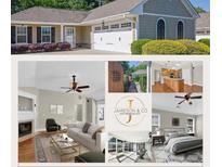 Charming single story home featuring an attached two car garage and manicured landscaping at 308 Jessica Way, Canton, GA 30114