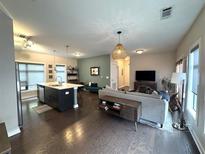 Bright and spacious living room featuring an open floorplan and modern furnishings at 35 Moda Ln, Atlanta, GA 30316