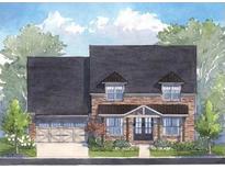 Charming new construction home with brick accents and a well-manicured lawn at 5325 Keepsake Court, Cumming, GA 30040