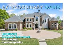 An extraordinary oasis featuring a luxurious European-style retreat with elegant, modern updates and manicured front yard at 1660 Norris Landing Dr, Snellville, GA 30039