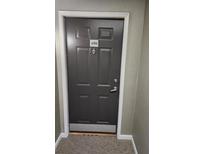 Apartment front door showing unit A506 with white trim and neutral carpet at 1075 Peachtree Ne Walk # 506, Atlanta, GA 30309