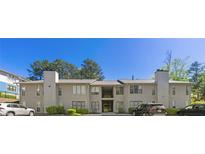 Inviting exterior view of a well-maintained two-story apartment complex on a sunny day at 1371 Branch Dr, Tucker, GA 30084
