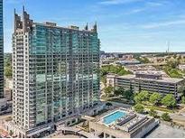 Stunning high rise condo with an exterior pool and breathtaking city views at 361 17Th Nw St # 1708, Atlanta, GA 30363