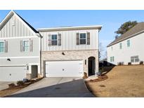 Charming two-story home features a brick facade, two-car garage, and well-manicured landscaping at 3367 Verdi Ln, Kennesaw, GA 30144