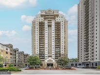Stunning high-rise building with multiple balconies and a grand entrance, offering city views at 795 Hammond Dr # 806, Sandy Springs, GA 30328