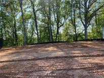 Beautiful empty lot ready for new construction located in a serene area with mature trees and space for outdoor activities at 4556 Sweetlake Sw Ct, Mableton, GA 30126