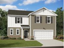 Charming two-story home with a landscaped yard, two-car garage, and neutral color palette at 14 Borland Rd, Villa Rica, GA 30180