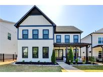 Stunning two-story home with black trim, well-manicured lawn, and inviting entrance at 3364 Old Concord Se Rd, Smyrna, GA 30082