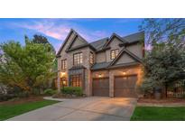 Charming two-story brick home with a well-manicured lawn and a two-car garage at 3749 Watkins Ne Pl, Brookhaven, GA 30319