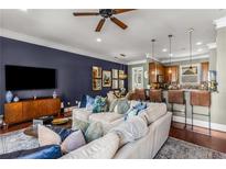 Inviting living room featuring a comfortable sectional sofa, hardwood floors, and stylish decor at 700 Piedmont Ne Ave # 4, Atlanta, GA 30308