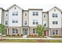 Charming townhomes with brick accents, neutral siding, and well-manicured landscaping at 1608 Falcon Crest Way # 58, Decatur, GA 30032