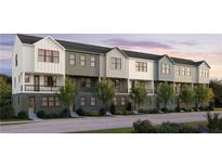 Charming row of new construction townhomes featuring modern farmhouse architecture and lush landscaping at 434 Argosy Park Cir # 13, Alpharetta, GA 30005