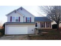 Charming two-story home featuring a 2 car garage and a welcoming front entrance at 3311 Basking Shade Ln, Decatur, GA 30034
