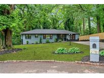Charming single-story home featuring a well-manicured lawn and brick mailbox at 2781 Long Way, Decatur, GA 30032