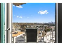 Relaxing balcony seating and sweeping city views make the perfect place to start your day at 250 Pharr Ne Rd # 1113, Atlanta, GA 30305
