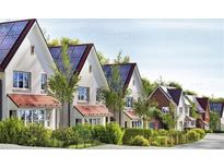Charming street view of modern homes with solar panels and well-maintained landscaping at 145 Alcovy Ter, Alpharetta, GA 30009
