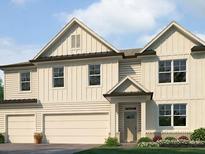 Charming two-story home boasts a modern farmhouse design with a two-car garage and manicured lawn at 171 Hampton Ter, Dallas, GA 30157