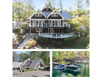Charming two-story home features a beautiful deck, steps leading to the house, and lush landscaping at 6255 Lakeview Dr, Buford, GA 30518