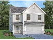 Charming two-story home featuring vertical siding, an attached garage, and a welcoming front entrance at 1518 Gatekeeper Ter, Marietta, GA 30066