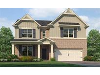 Charming two-story home featuring a brick and siding exterior, complemented by dark shutters and a well-manicured lawn at 1129 Georgian Point Dr, Lawrenceville, GA 30045