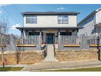 Charming two-story home with a welcoming front porch and attractive curb appeal at 230 Woodward Se Ave, Atlanta, GA 30312