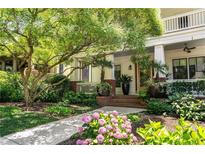 Charming home entrance featuring a covered porch, meticulous landscaping, and a welcoming walkway at 1601 Marlbrook Ne Dr, Atlanta, GA 30307