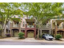 Charming townhomes featuring private garages, balconies, and well-maintained landscaping at 863 Commonwealth Se Ave, Atlanta, GA 30312