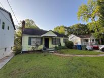 Charming one-story home with a cozy front yard and welcoming curb appeal in a serene neighborhood at 944 Stallings Se Ave, Atlanta, GA 30316