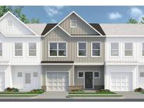 Charming townhome featuring a modern exterior with a one car garage at 99 Alameda St # 14, Loganville, GA 30052