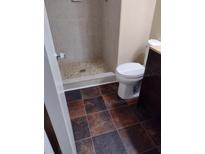 Tile shower and multi-color floor in this bathroom at 3088 Balearic Dr, Marietta, GA 30067