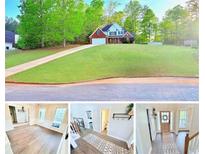 Charming two-story home with a beautifully landscaped front yard and vibrant green trees at 515 Sherwin Ct, Mcdonough, GA 30252