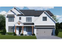 Charming two-story home with a white brick facade, gray roof, and attached two-car garage at 3900 Ivy Cottage Dr, Snellville, GA 30039