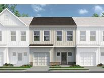 Charming townhome with a one-car garage and inviting facade, blending brick accents with modern design for curb appeal at 107 Alameda St # 16, Loganville, GA 30052