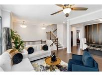 Bright living room boasts an open layout, stylish decor, and hardwood floors, creating an inviting space at 371 Northaven Ave, Suwanee, GA 30024