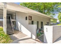Charming condo featuring well-maintained grounds and convenient stair access at 1150 Collier Nw Rd # K18, Atlanta, GA 30318