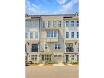Charming townhome featuring a neutral color, garage, and a well-maintained facade at 24 Becker Nw Pl, Atlanta, GA 30307