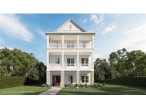 Charming three-story home featuring double balconies and a welcoming entrance at 1417 Coretta Scott Bnd, Atlanta, GA 30318