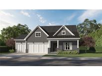 Beautiful home featuring a three car garage, well manicured lawn, and a modern farmhouse feel at 3543 Cedarvale Ct, Powder Springs, GA 30127