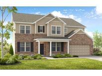 Two-story home with a brick and siding exterior, attached garage, and manicured front lawn at 5335 Trescott Path, Cumming, GA 30028