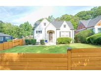 Charming home with a well-manicured lawn and inviting exterior at 98 Chappell Nw Rd, Atlanta, GA 30314